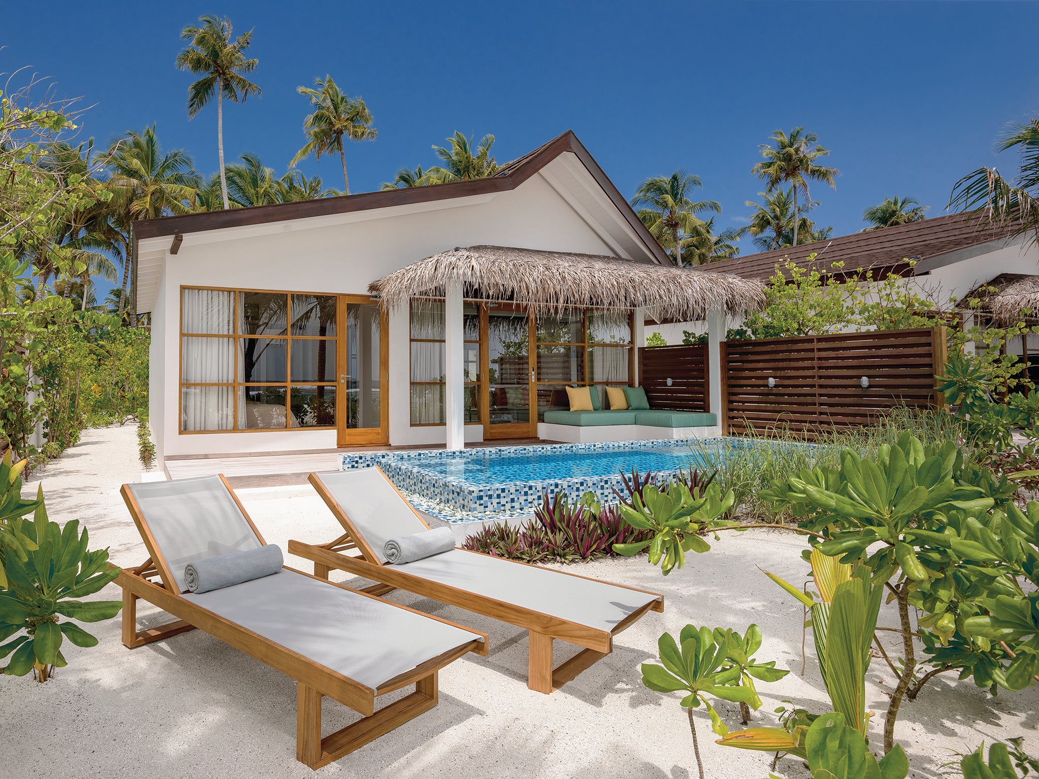 The two-bedroom family villas are bright and spacious