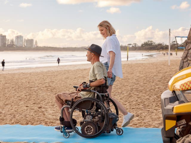 <p>Accessible beach mats are opening up beaches like Mooloolaba to wheelchair users</p>