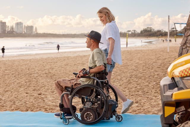 <p>Accessible beach mats are opening up beaches like Mooloolaba to wheelchair users</p>