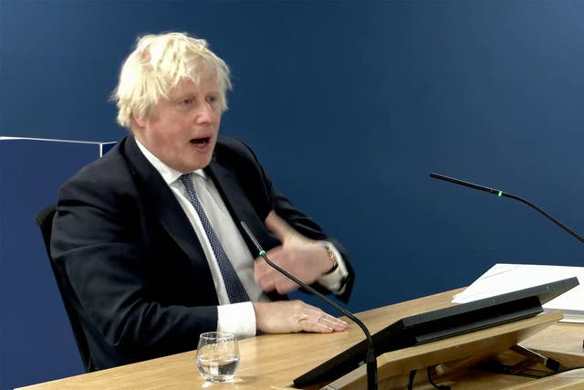<p>Britain's former Prime Minister Boris Johnson giving evidence at the UK Covid-19 Inquiry, in west London, on Thursday </p>