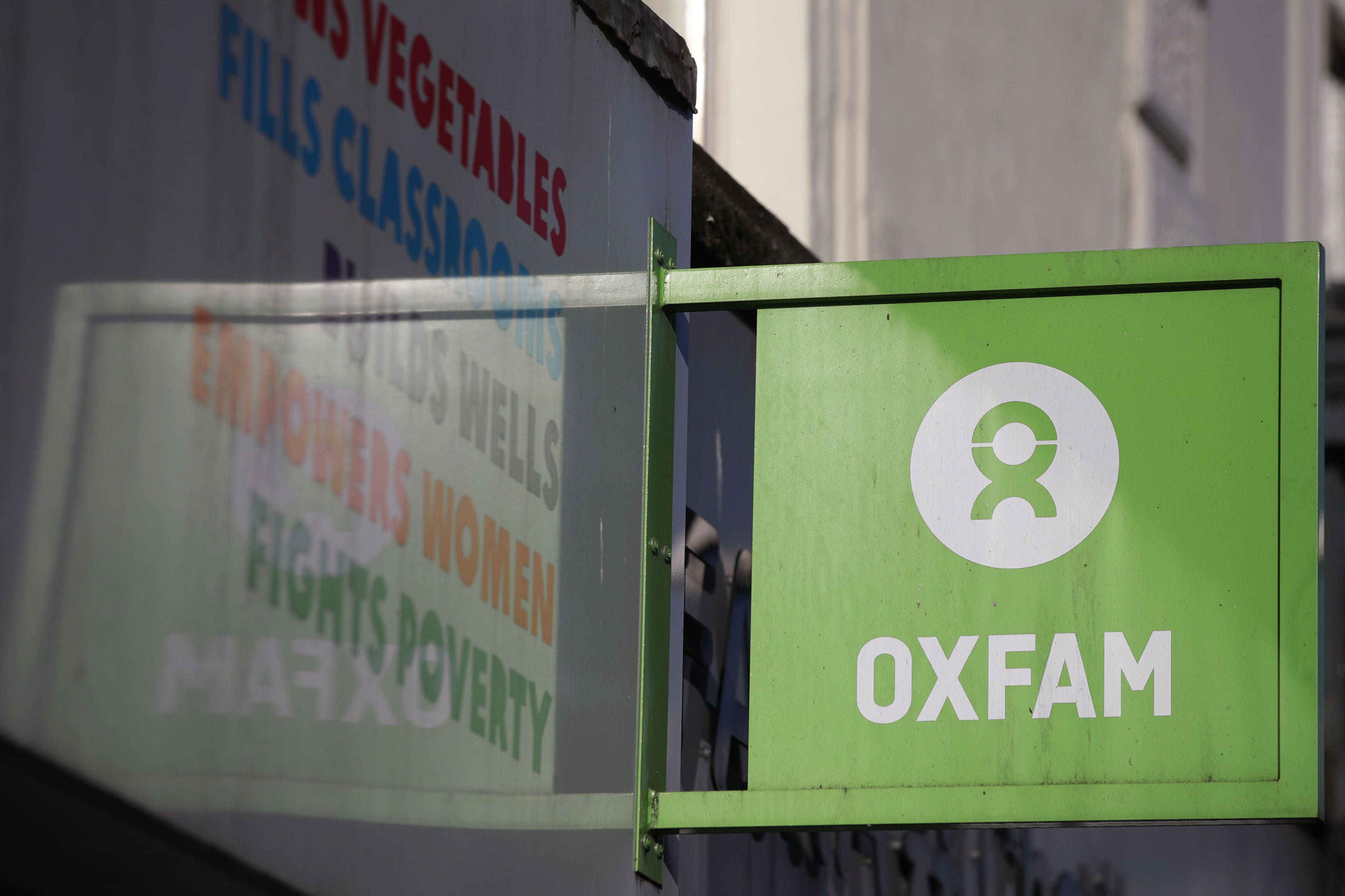 An Oxfam shop sign in London (Yui Mok/PA)