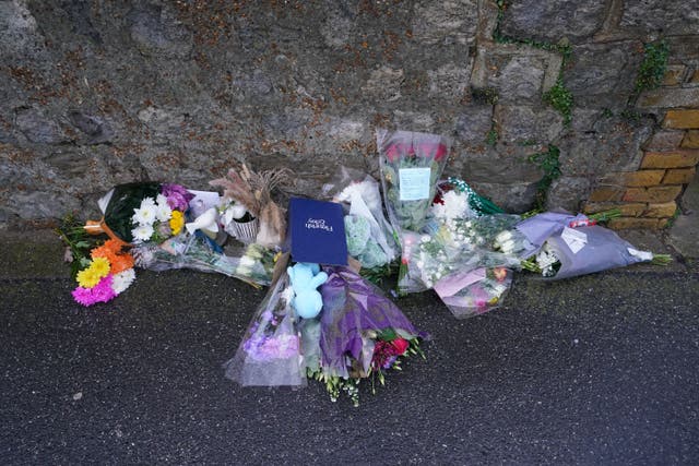 Flowers and messages left at the scene in Sandgate, near Folkestone, after seven-year-old William Brown was killed in a hit-and-run (Gareth Fuller/PA)