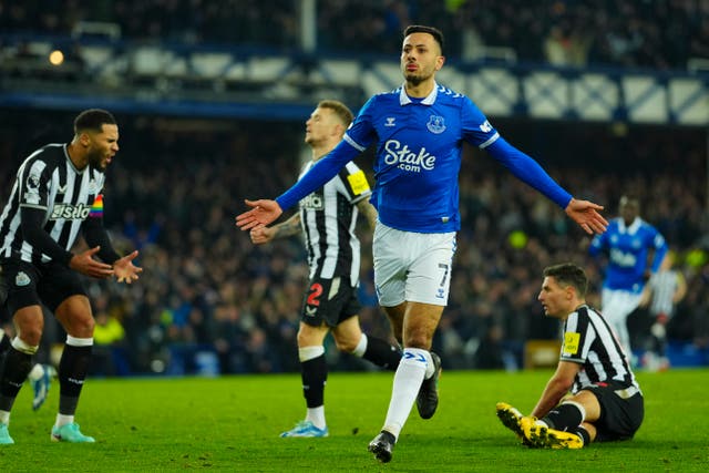 <p>Dwight McNeil celebrates after scoring the opening goal for Everton on Thursday evening </p>