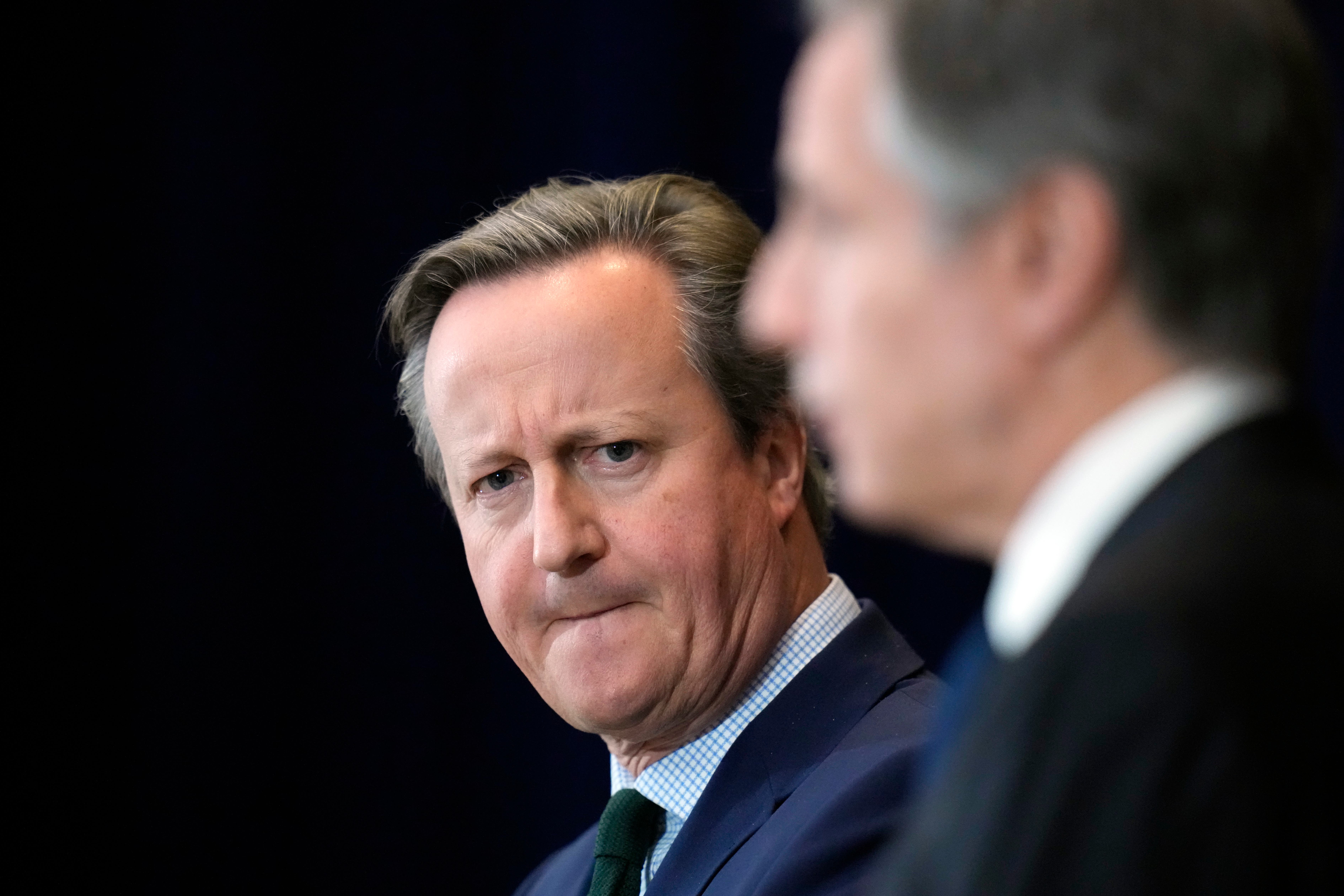 British Foreign Secretary David Cameron listens as Secretary of State Antony Blinken answers a question from a reporter (Alex Brandon/AP)