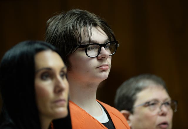 <p>Ethan Crumbley stands with his attorneys, Paulette Loftin and Amy Hopp, during his hearing at Oakland County Circuit Court, Aug. 1, 2023, in Pontiac, Mich. Crumbley, who killed four other students at a Michigan school will listen to their families and survivors of the mass shooting before a judge decides whether the attack will carry a life prison sentence on Friday, Dec. 8, 2023. (Clarence Tabb Jr./Detroit News via AP, Pool, File)</p>