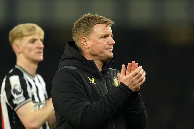 <p>Eddie Howe salutes the Newcastle fans after full-time</p>