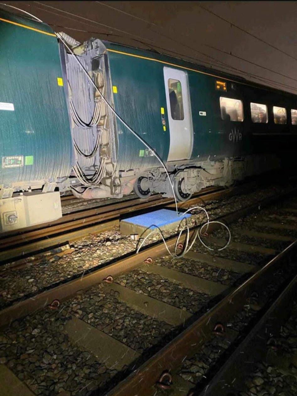 The train with damaged overhead electric cables in the Ladbroke Grove area of west London