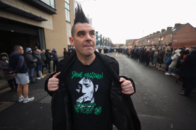 Fan John Farrell waited outside Shelbourne Park Stadium for the funeral procession of Shane MacGowan (Liam McBurney/PA)