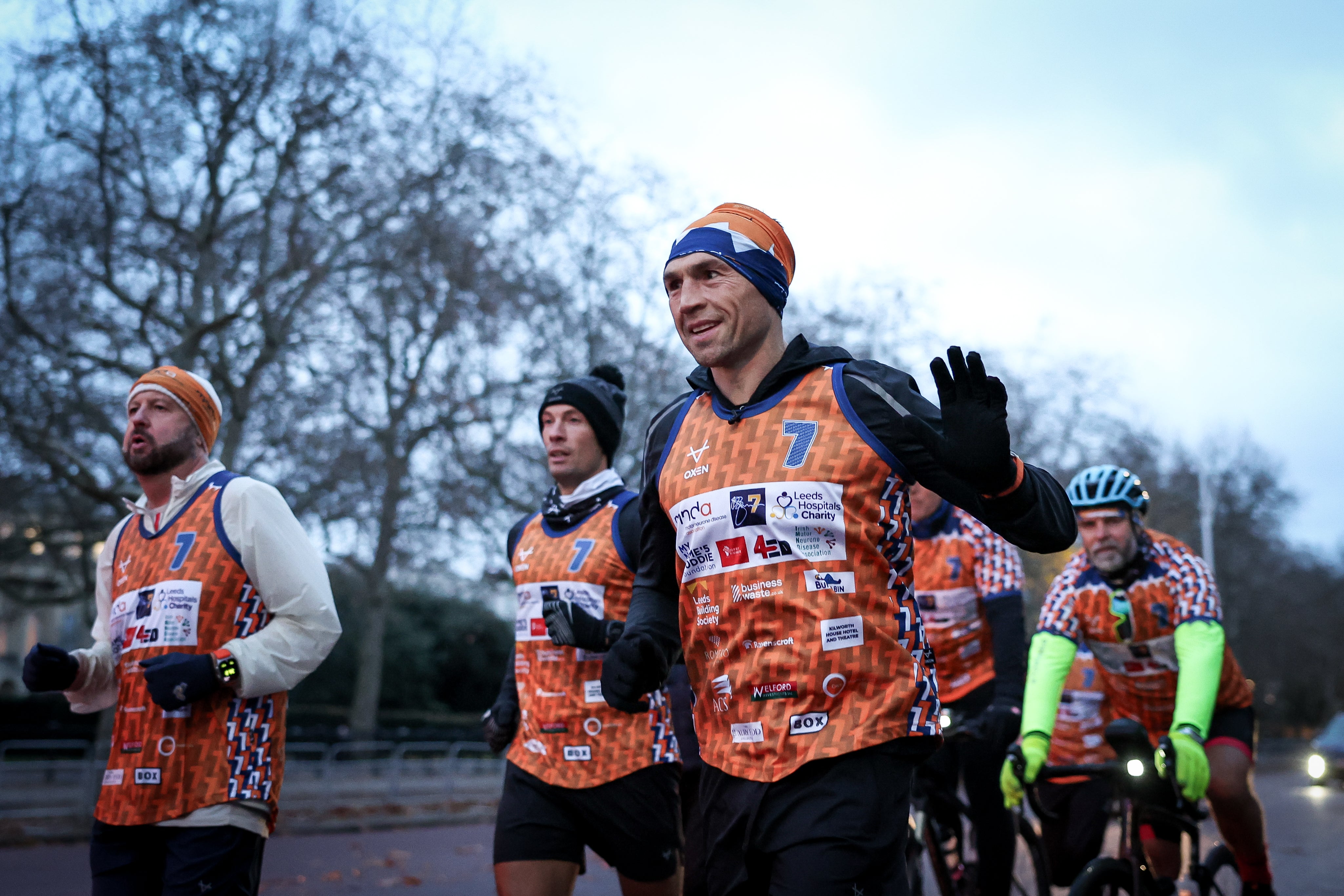 Sinfield running on The Mall in central London