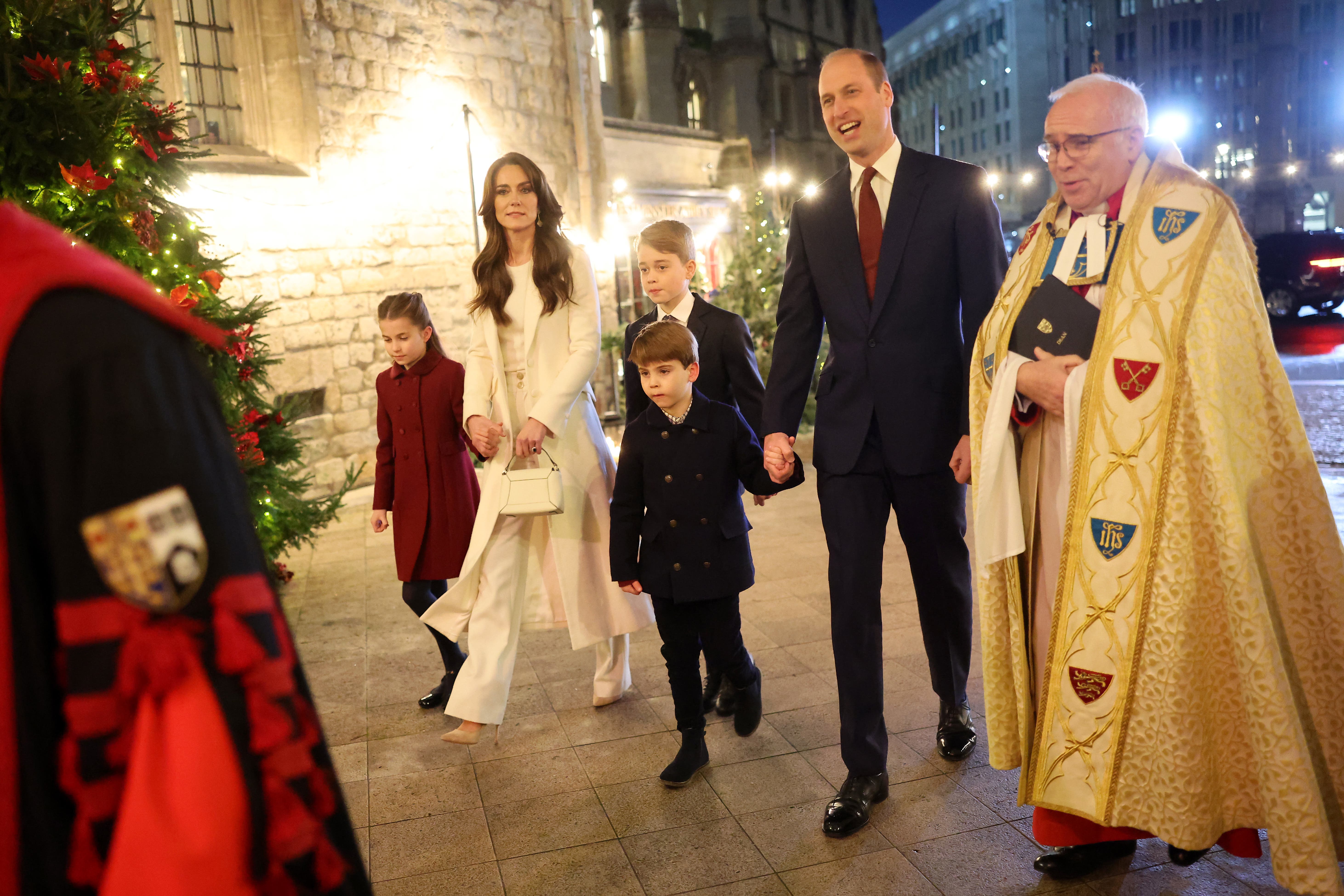 Princess Charlotte, the Princess of Wales, Prince George, Prince Louis, the Prince of Wales and The Dean of Westminster Abbey, The Very Reverend Dr David Hoyle arriving for the Royal Carols – Together At Christmas service at Westminster Abbey (Chris Jackson/PA)