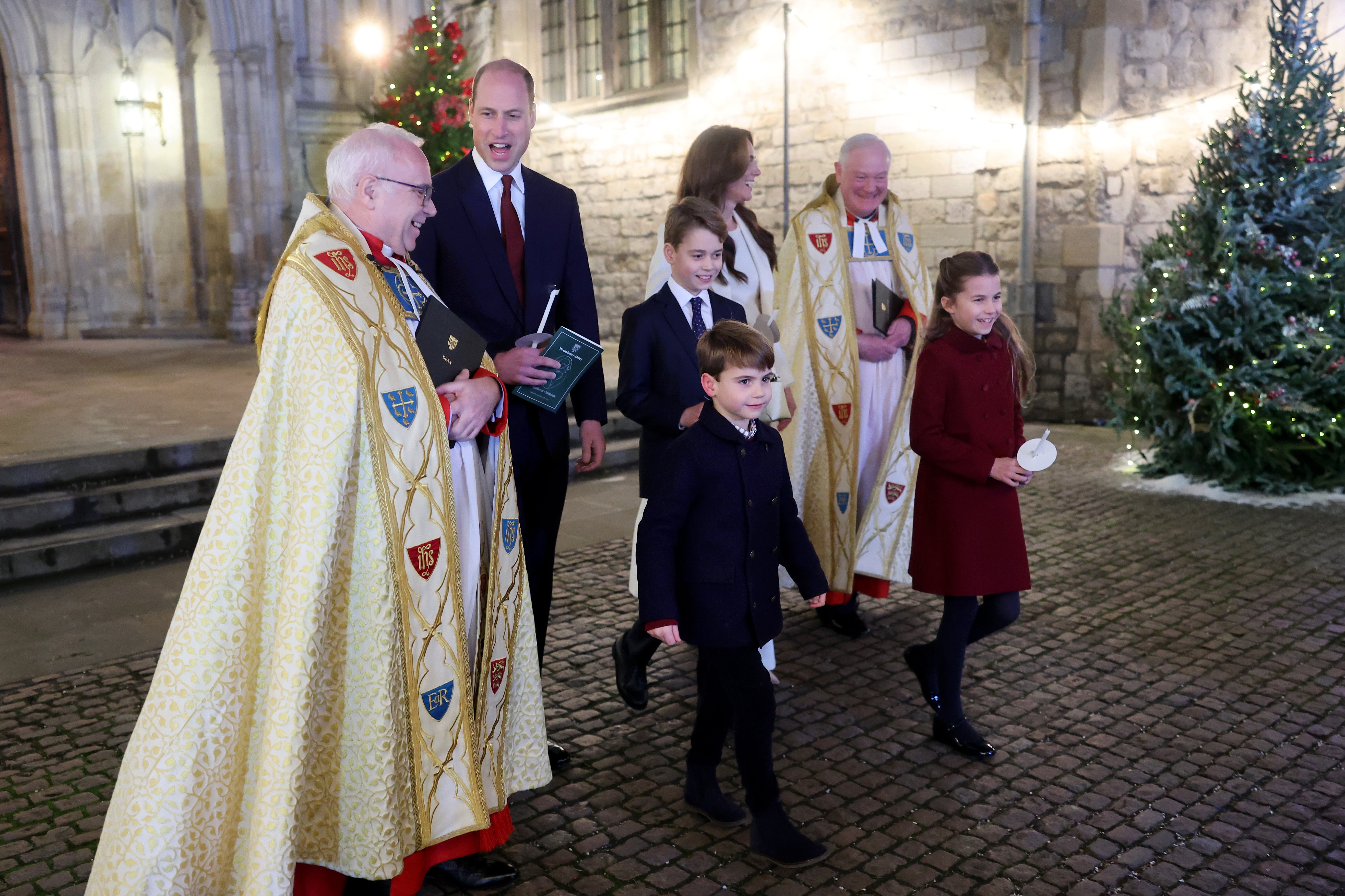 <p>The Dean of Westminster Abbey, The Very Reverend Dr David Hoyle, the Prince of Wales, Prince George, Prince Louis, the Princess of Wales and Princess Charlotte leave after the service </p>