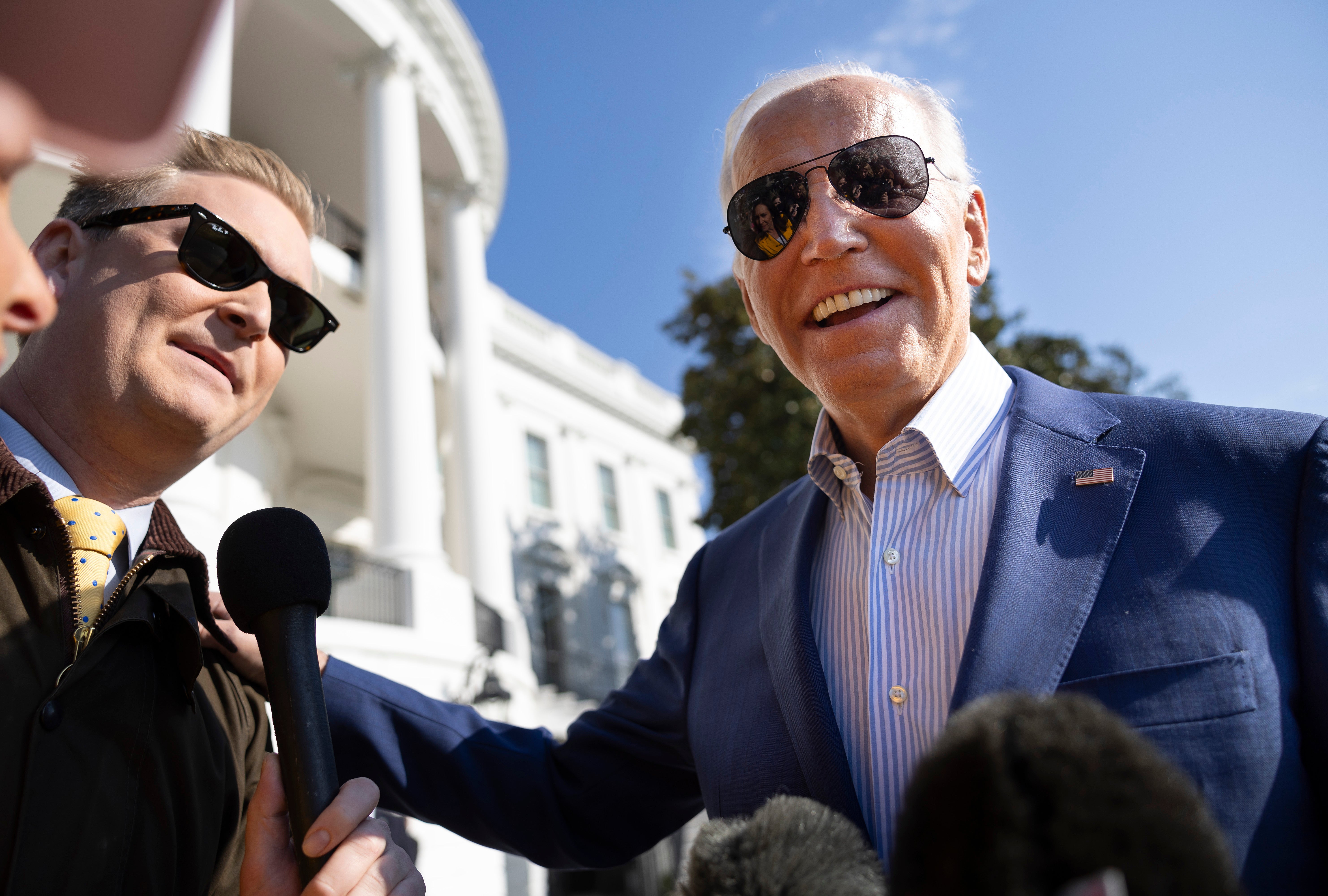President Joe Biden answers a question from Fox News correspondent Peter Doocy as he speaks to members of the media while departing the White House on November 09, 2023 in Washington, DC