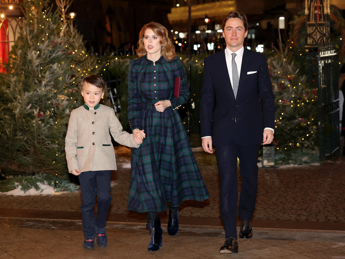Princess Beatrice holds hands with stepson Wolfie at Christmas concert |  The Independent