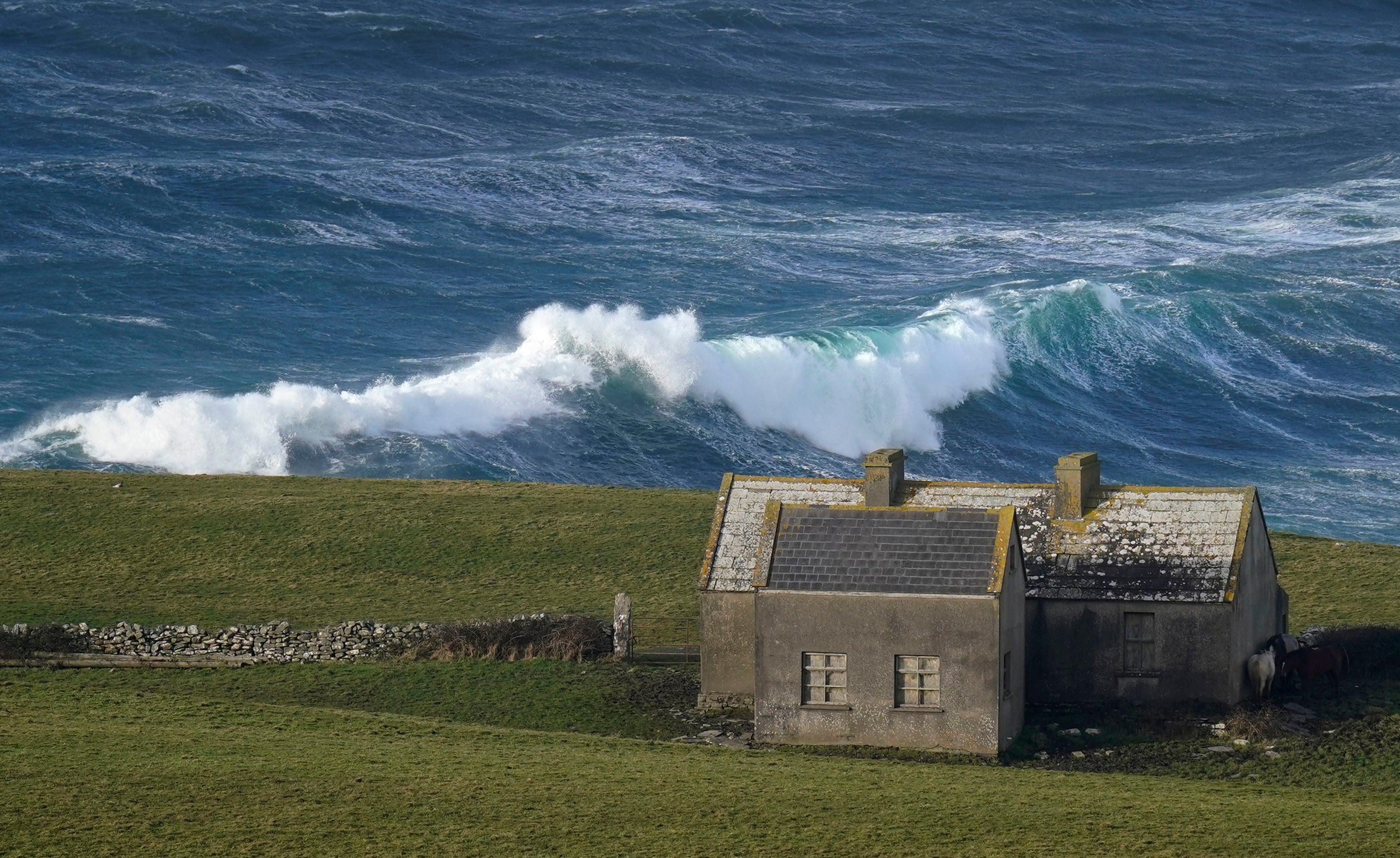 Waves crashing against the shore at Doolin in County Clare on the west coast of Ireland