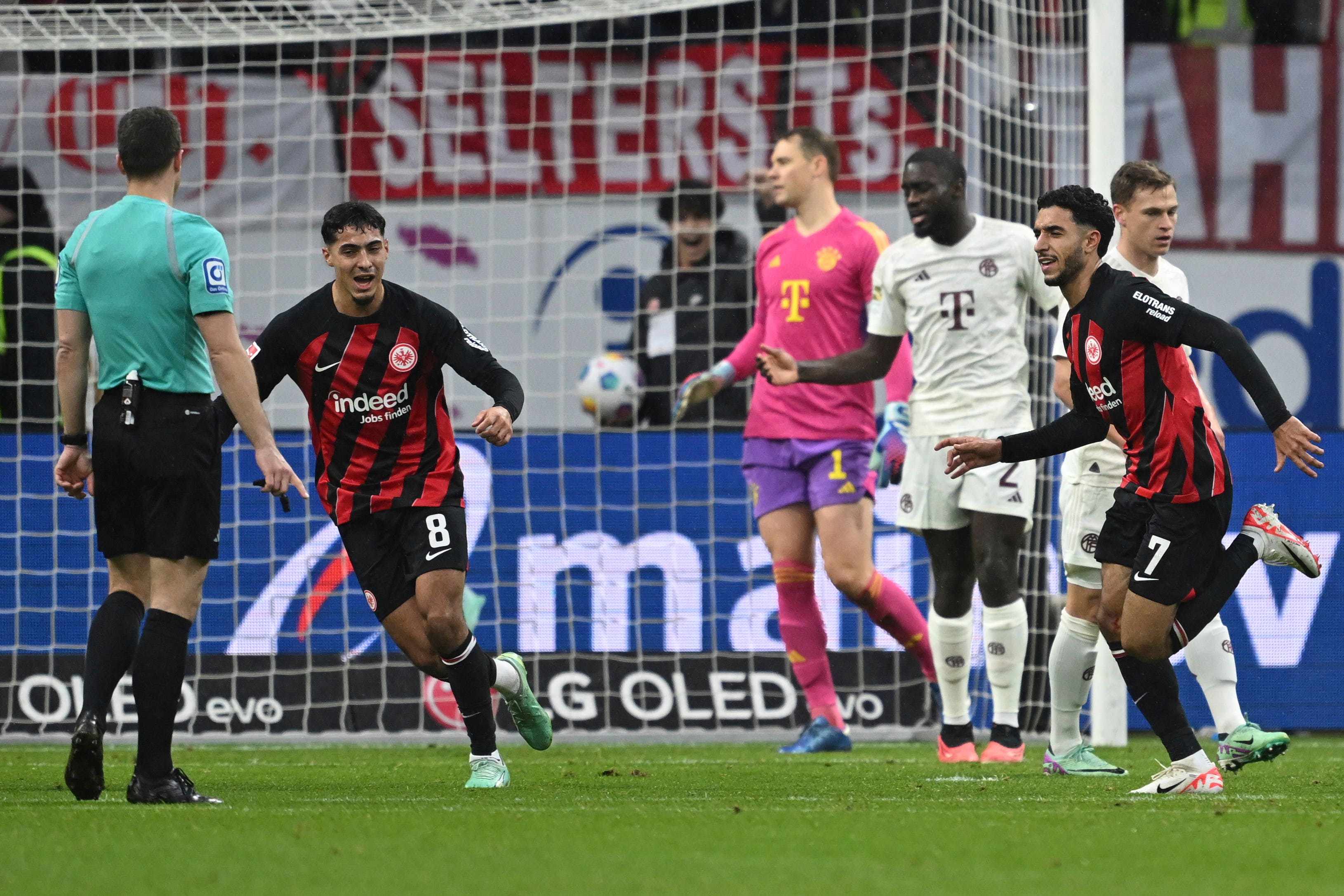 Goalkeeper Manuel Neuer is beaten again in Bayern Munich’s 5-1 Bundesliga defeat to Eintracht Frankfurt (Arne Dedert/dpa via AP)