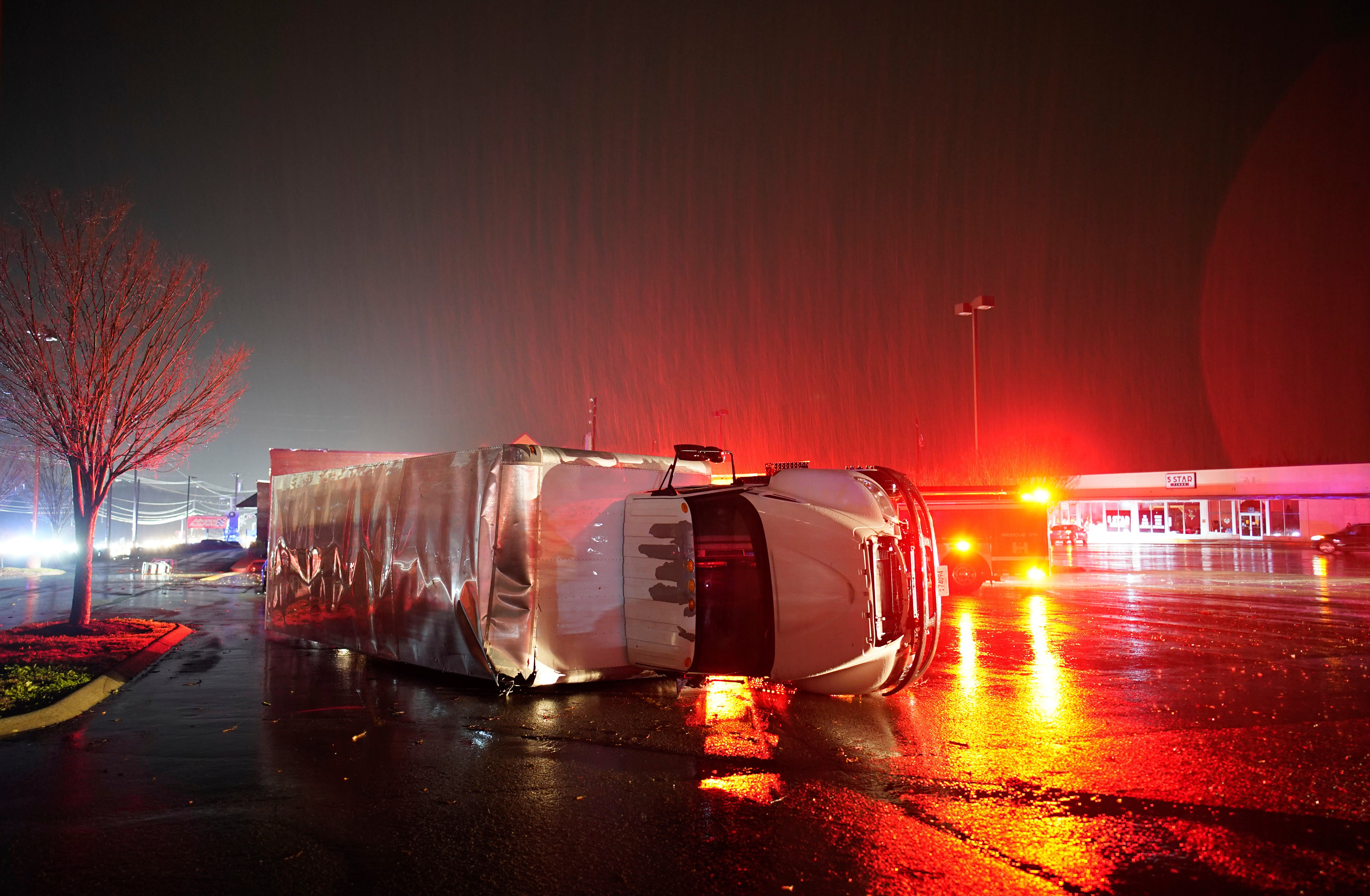 A semitrailer is overturned by an apparent tornado on West Main Street in Hendersonville, Tennessee