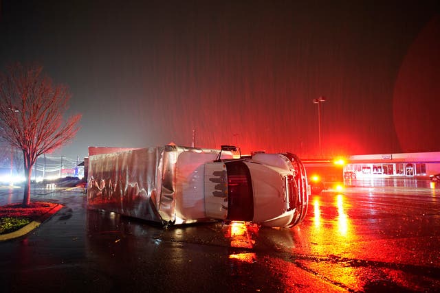 <p>A semitrailer is overturned by an apparent tornado on West Main Street in Hendersonville, Tenn., Saturday, 9 December 2023</p>