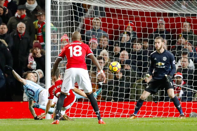 Nicolas Otamendi (left) scored the winning goal for Manchester City against Manchester United in 2017 (Martin Rickett/PA)