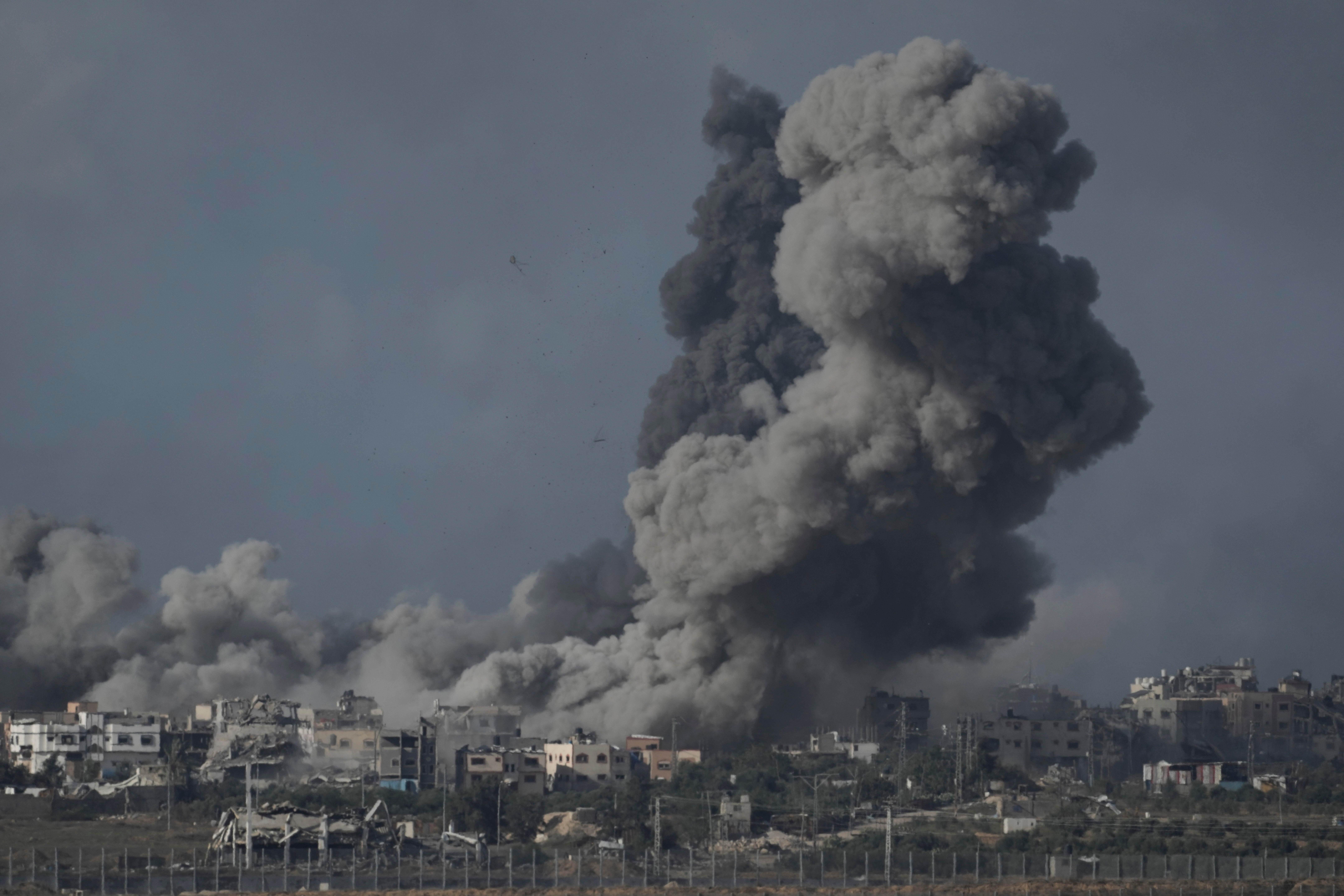 Smoke rises from the Gaza Strip after Israeli strikes on Saturday