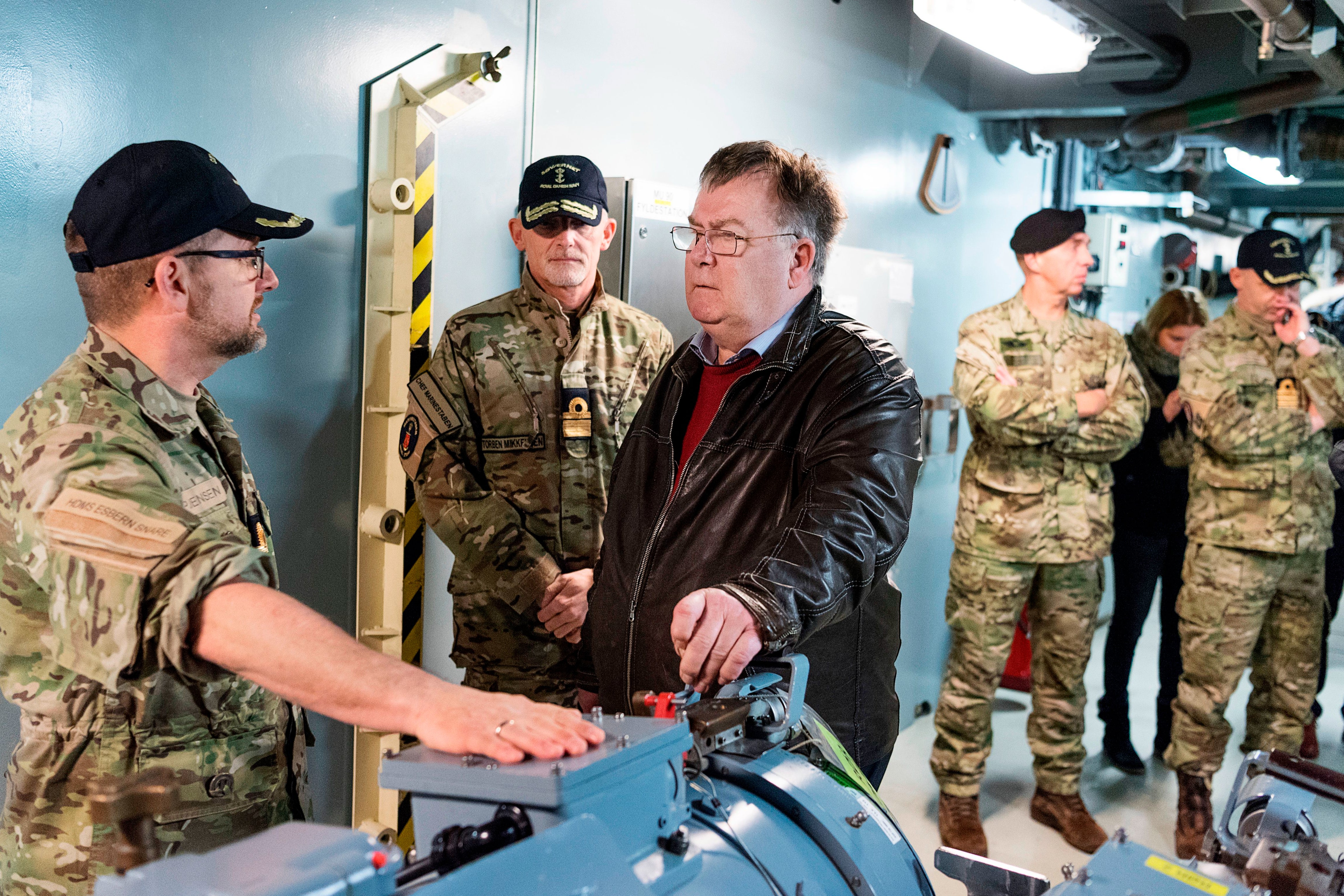 Claus Hjort Frederiksen meets crew on the Danish warship Esbern Snare during his time as defence minister
