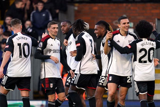 Tosin Adarabioyo (third left) celebrates scoring Fulham’s third goal (Adam Davy/PA)
