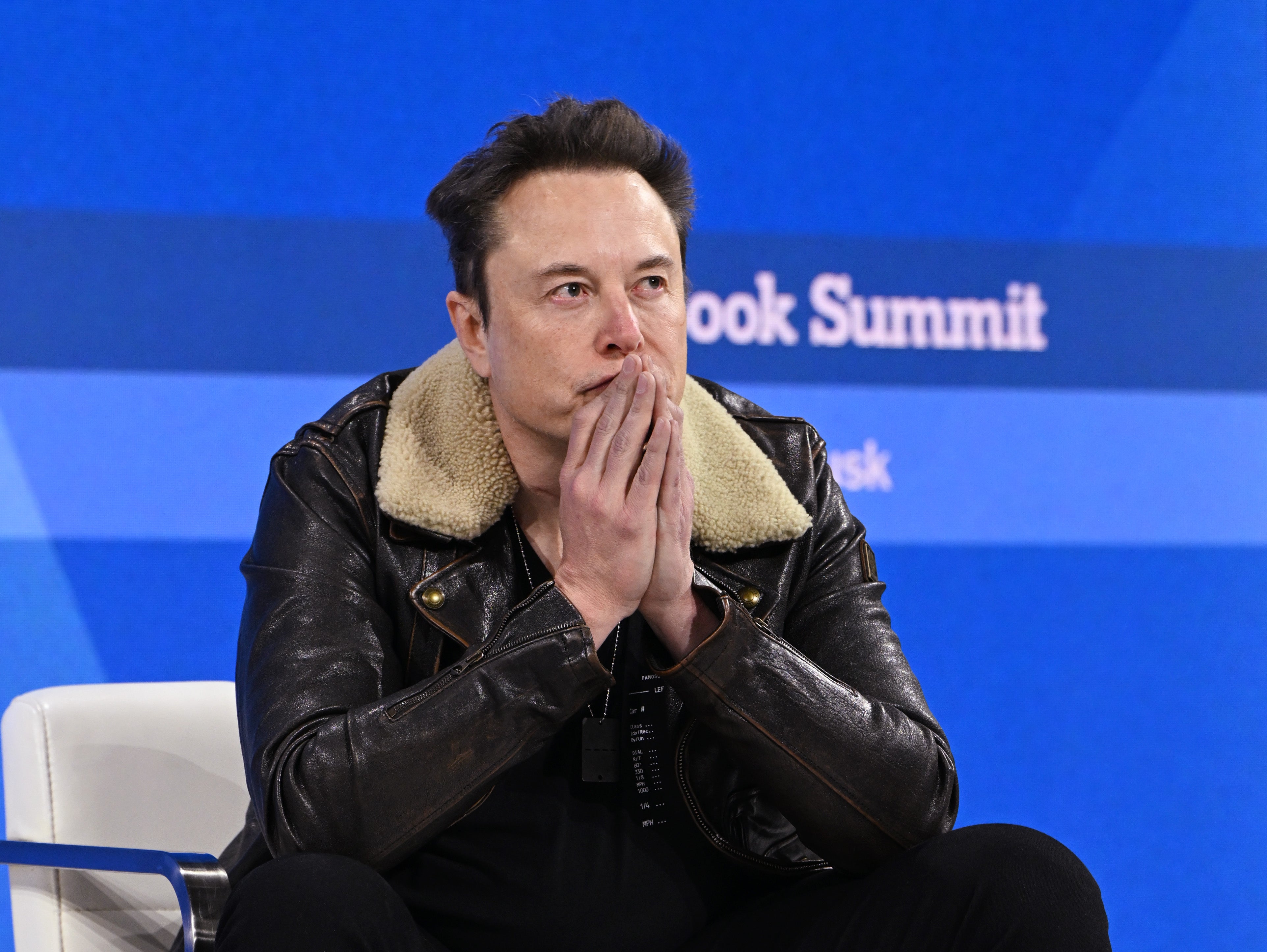 <p>Elon Musk speaks onstage during The New York Times Dealbook Summit 2023 at Jazz at Lincoln Center on November 29, 2023 in New York City</p>