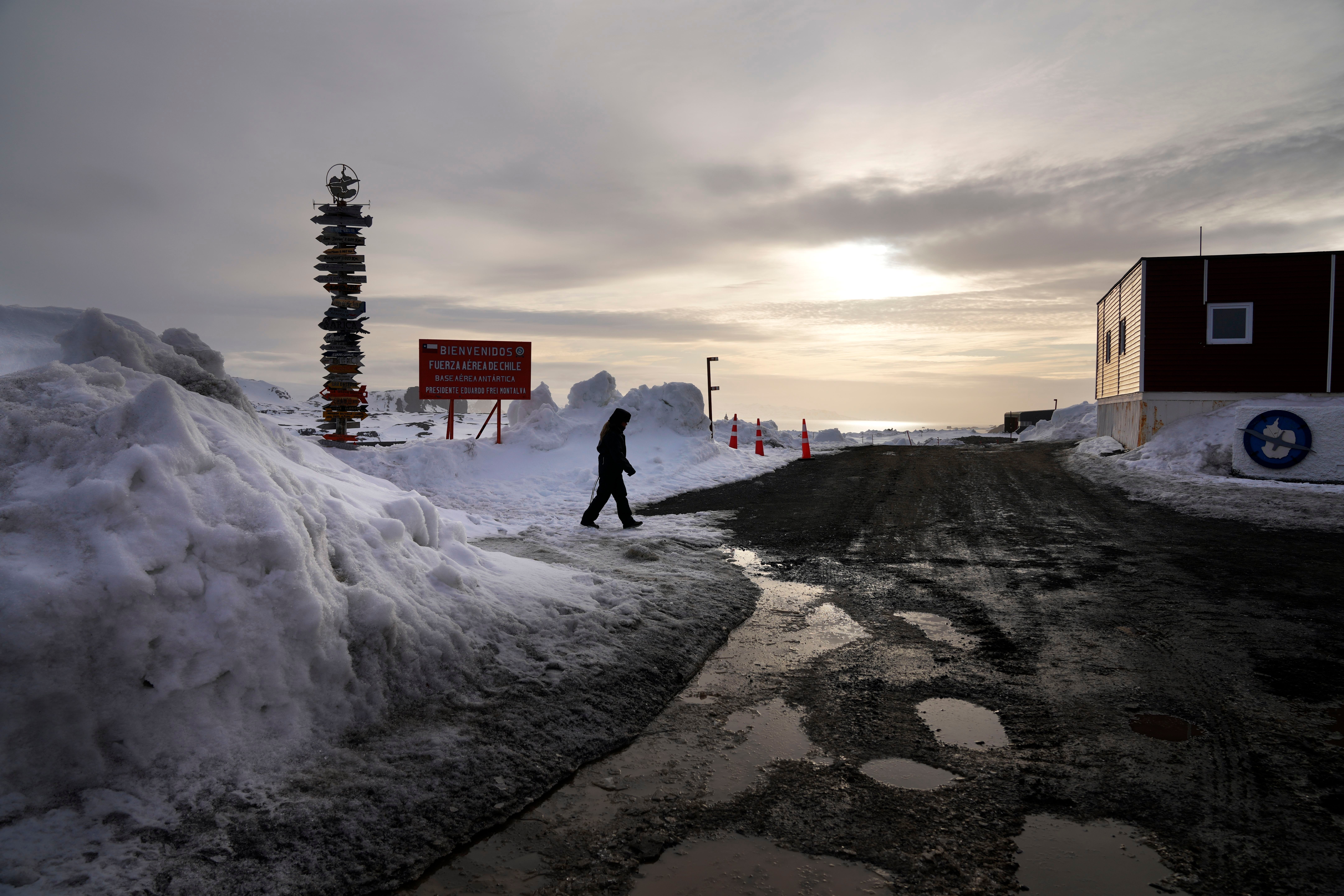 A woman walks outside Chile's Eduardo Frei Air Force Base at King George Island, South Shetlands, Antarctica, Nov. 25, 2023.