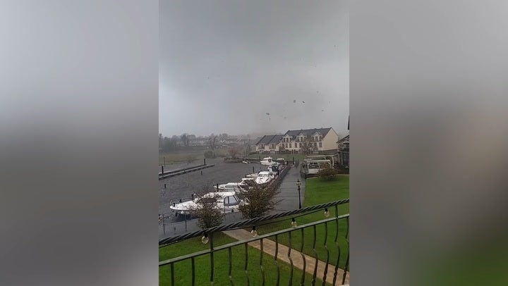 <p>Watch ‘tornado’ sweep through Irish village destroying homes and cars in its path.</p>