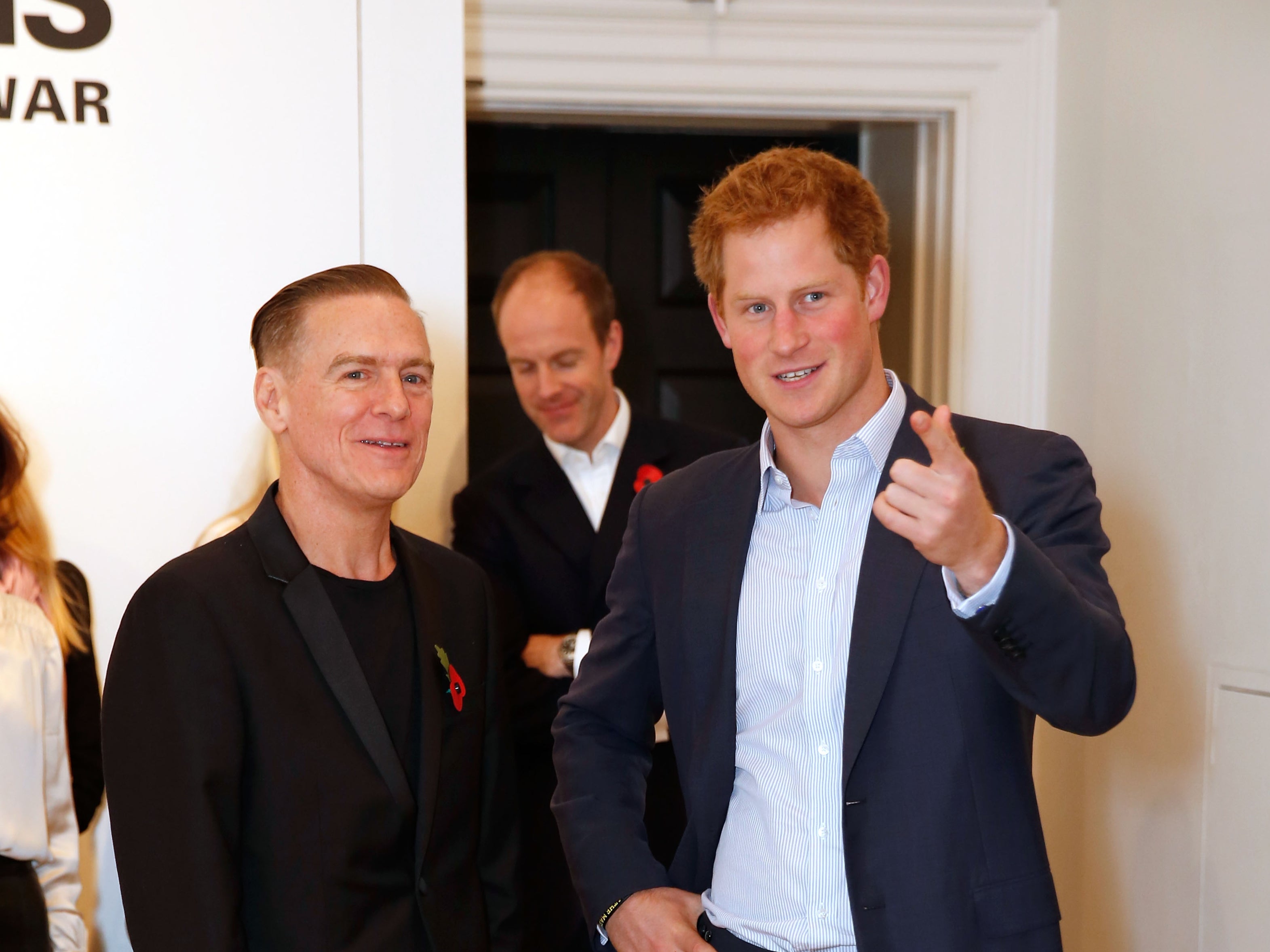 Bryan Adams with Prince Harry in 2014