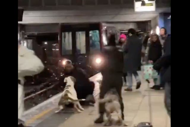 <p>The man nearly falls in front of a train</p>