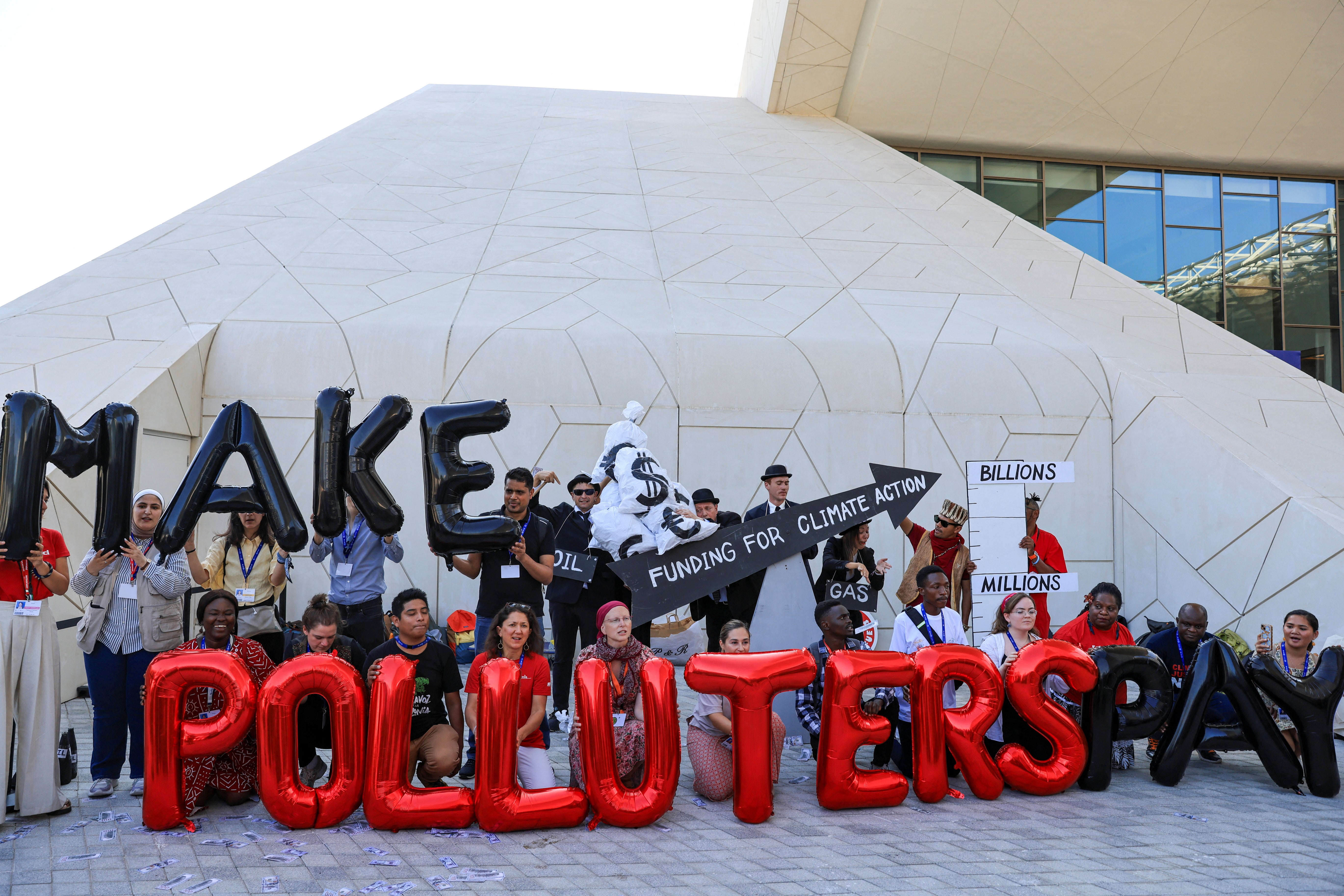 Climate activists protest during the Cop28 summit