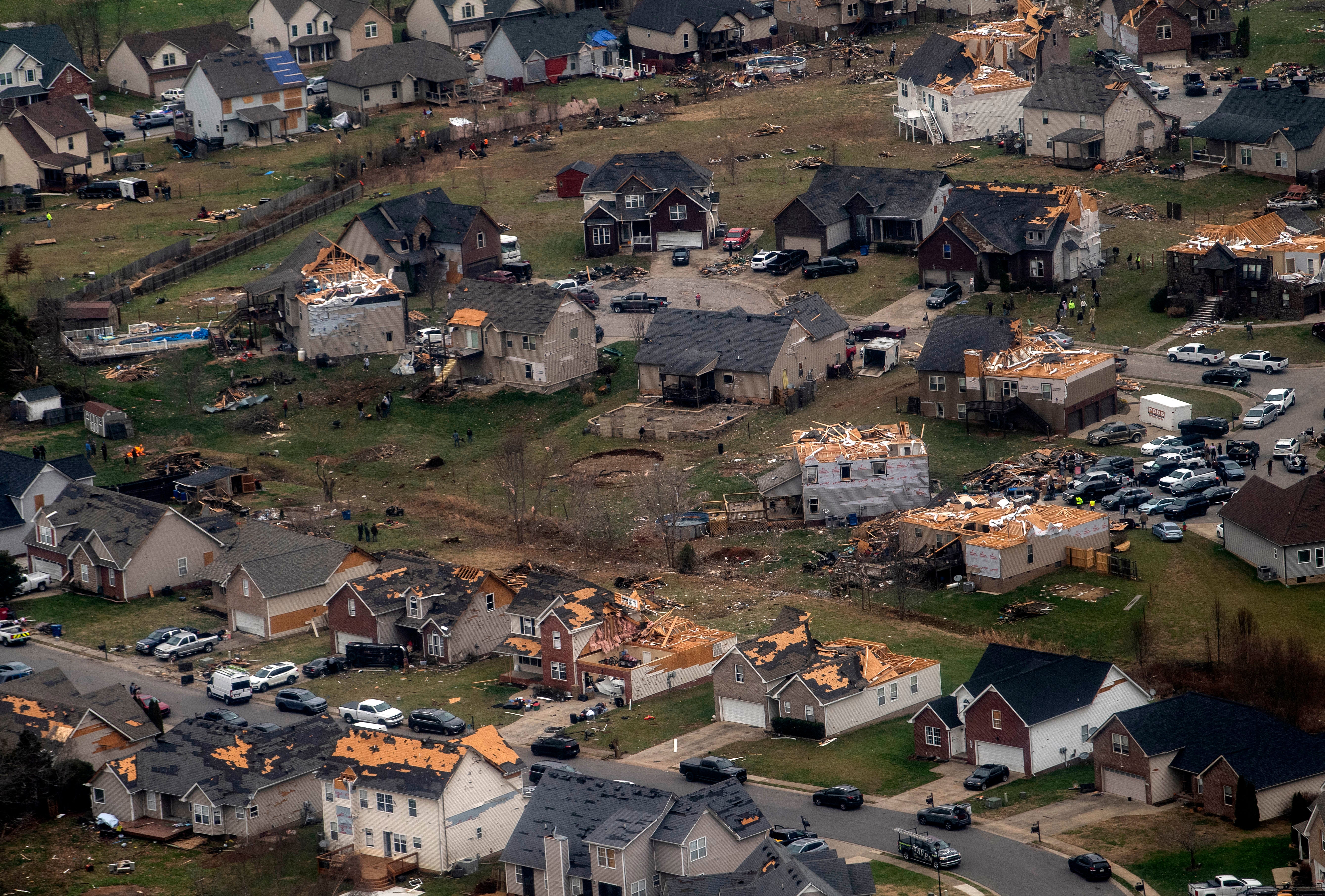 This aerial view from a Blackhawk helicopter shows damaged homes after a series of tornados swept through Tennessee