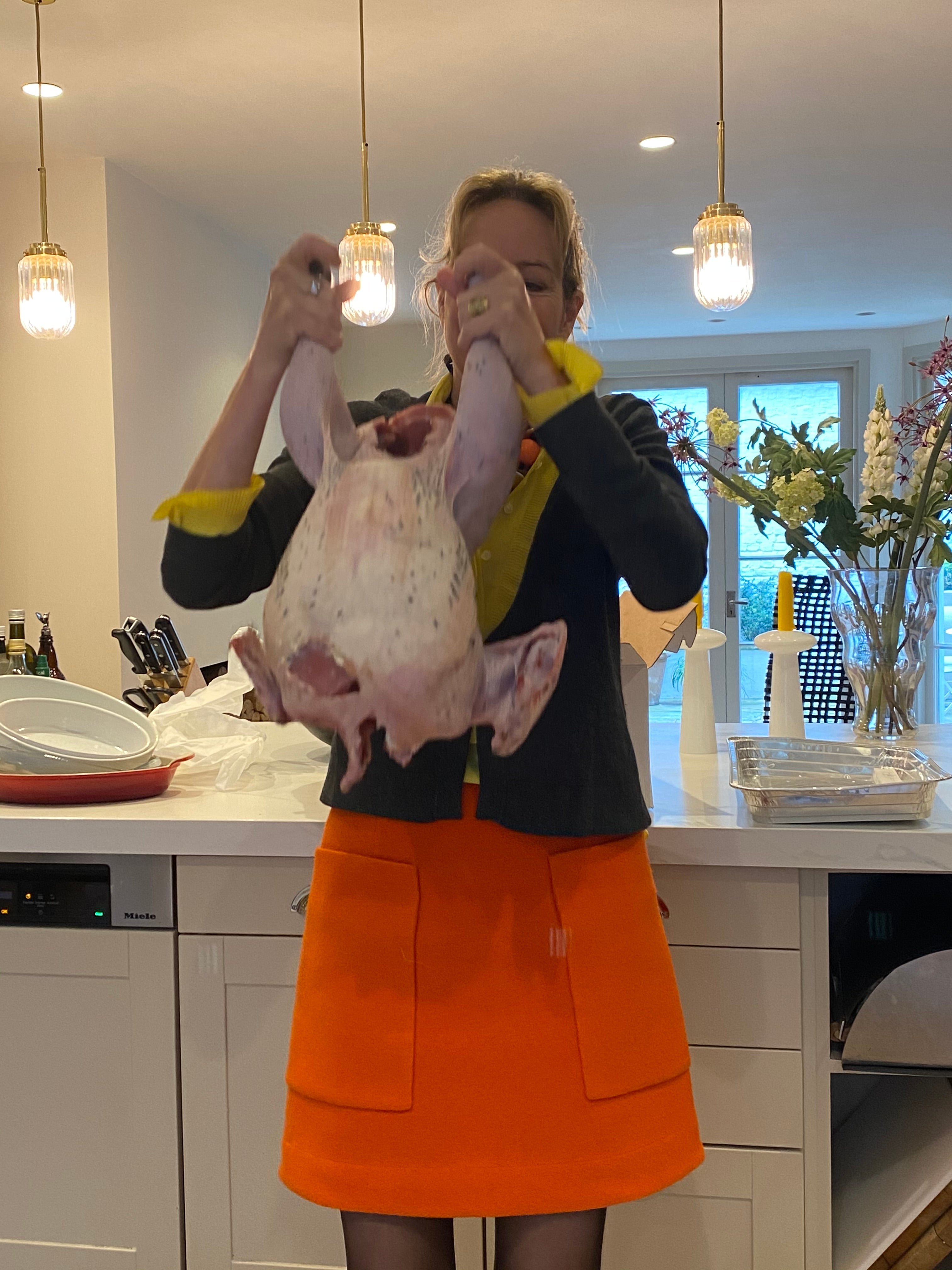Helen with a turkey that needs to be stuffed – just don’t ask her to do it