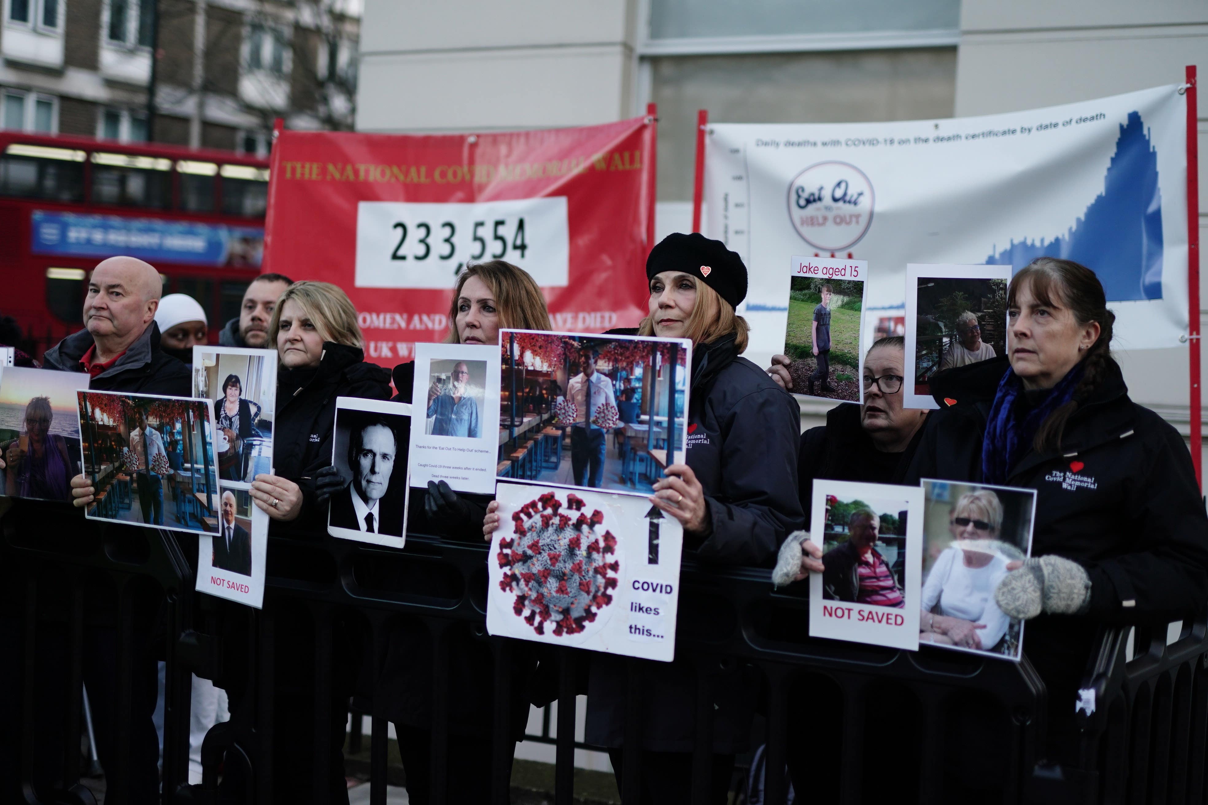 Protesters outside the UK Covid-19 Inquiry where Rishi Sunak was giving evidence on Monday (Jordan Pettitt/PA)