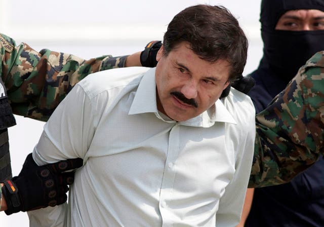 <p>FILE - This Feb. 22, 2014 file photo shows Joaquin "El Chapo" Guzman, the head of Mexico's Sinaloa Cartel, being escorted to a helicopter in Mexico City following his capture in the beach resort town of Mazatlan. Guzman's mother Consuelo Loera died on Sunday, Dec. 10, 2023, according to local media and confirmed by Mexican President Andrés Manuel López Obrador. (AP Photo/Eduardo Verdugo, File)</p>