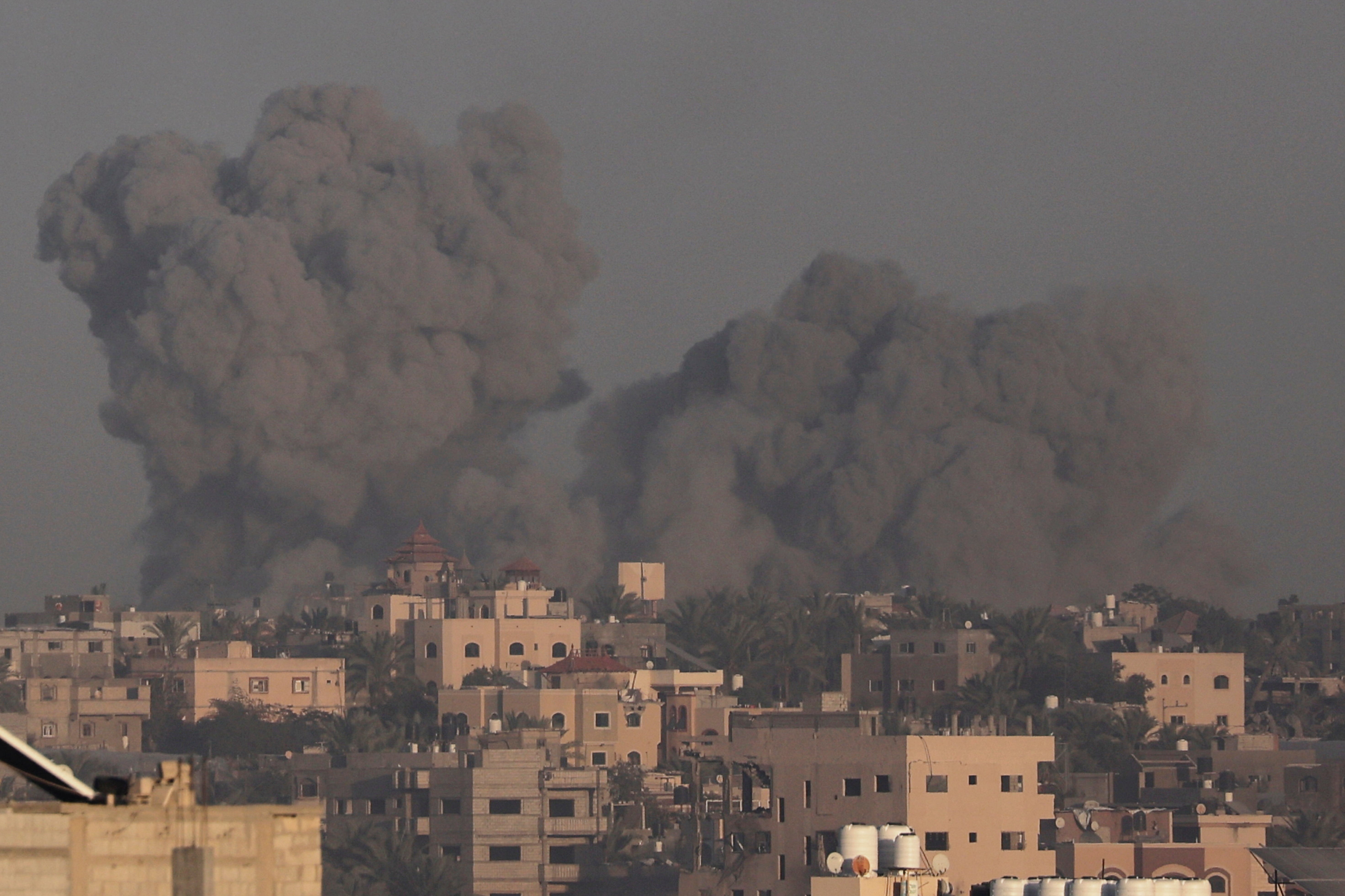 Smoke rises after Israeli strikes on the southern Gaza city of Khan Younis