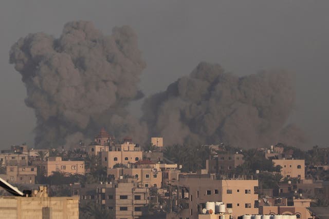<p>Smoke rises after Israeli strikes on the southern Gaza city of Khan Younis</p>