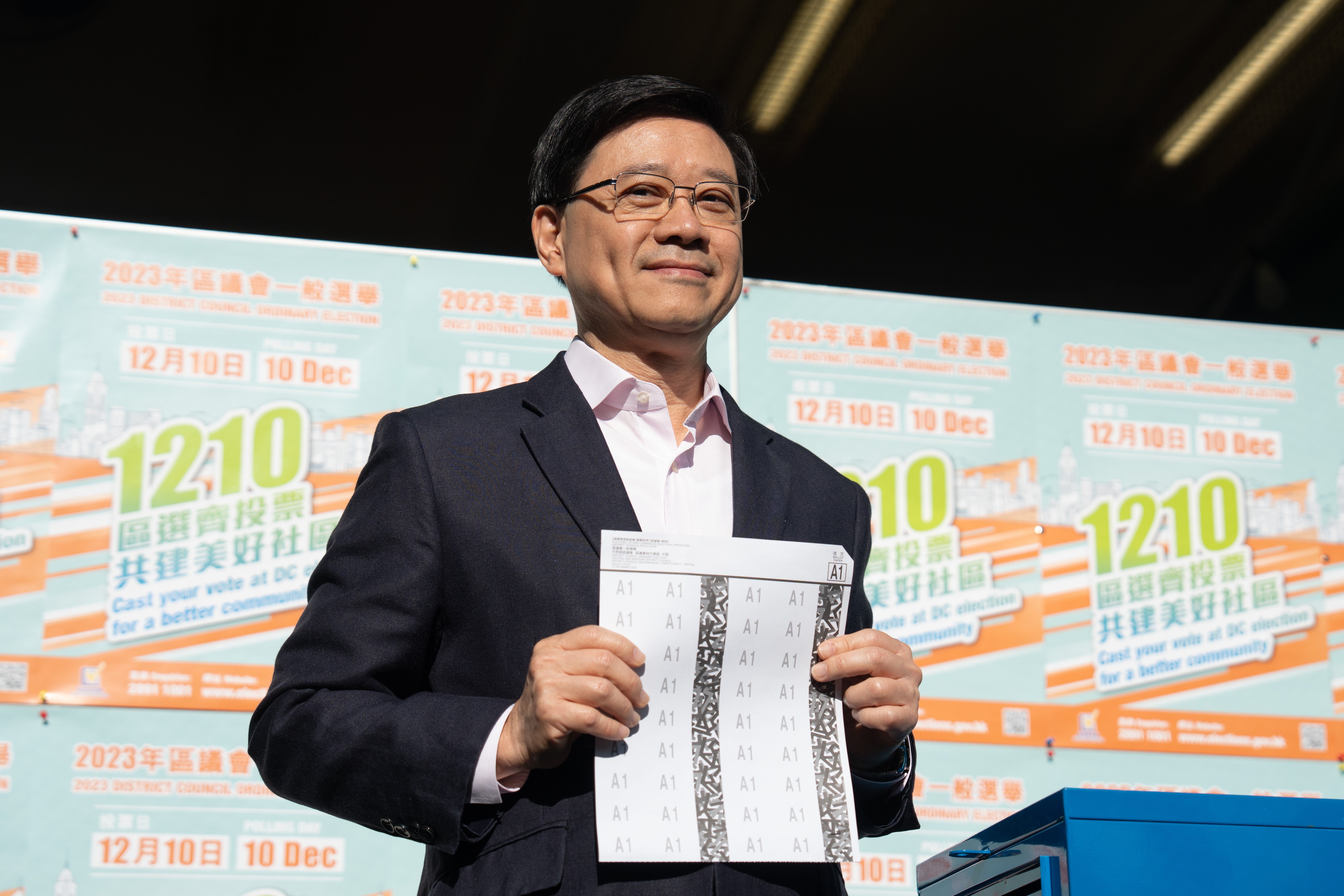 Hong Kong Chief Executive John Lee casts his vote for the District Council Ordinary Election in Hong Kong