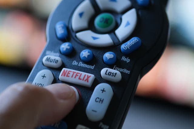 <p>In this illustration photo taken on July 19, 2022 the Netflix logo is seen on a TV remote in Los Angeles. - Netflix reported losing subscribers for the second quarter in a row Tuesday as the streaming giant battles fierce competition and viewer belt tightening</p>