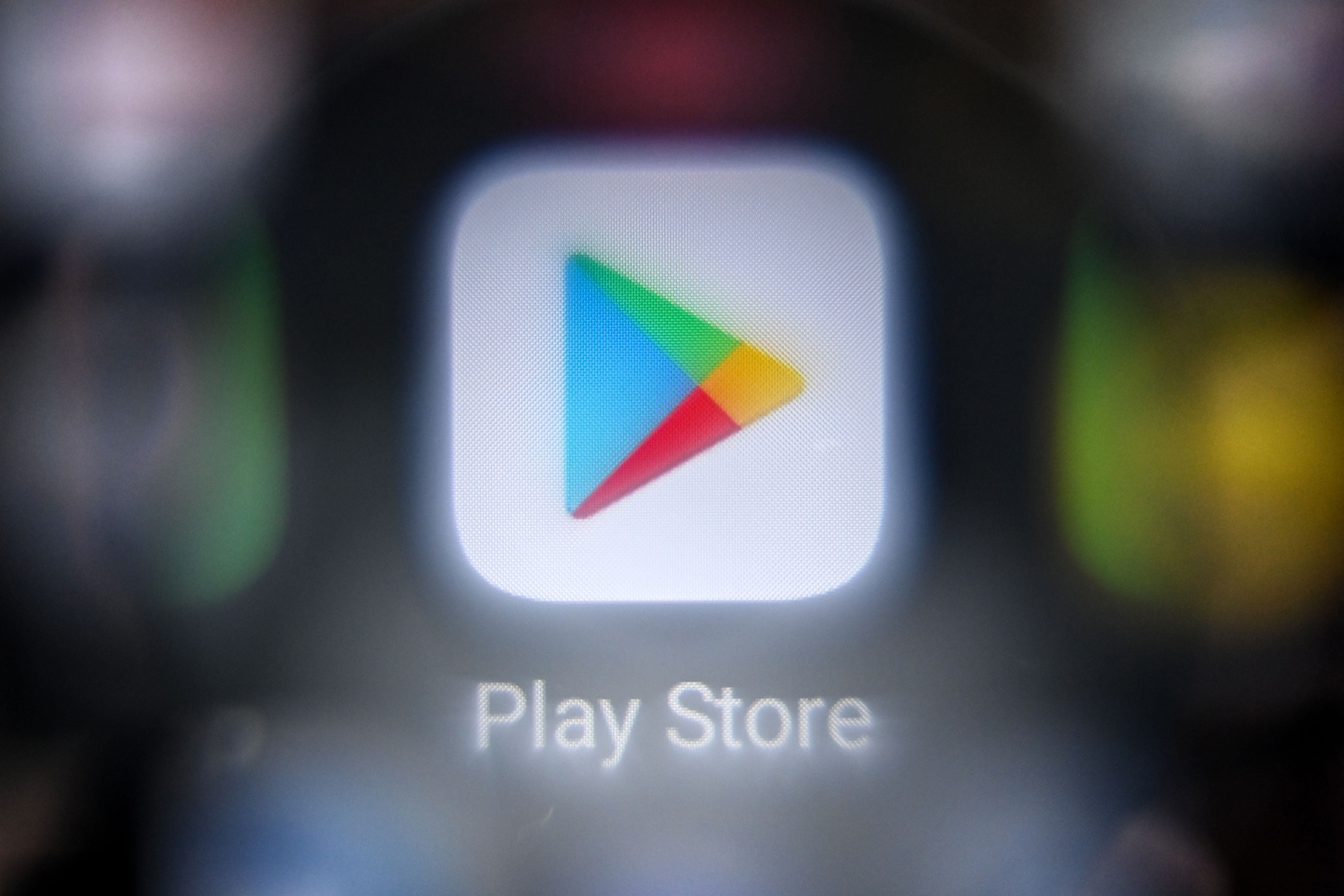 An illustration picture taken on April 21, 2022 in Moscow shows a smart phone screen bearing the Google Play store application logo