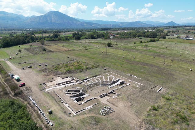 Archaeologists have unearthed the remains of a roofed theatre, a market and a river port at the site of a Roman town in central Italy (Cambridge University/PA)