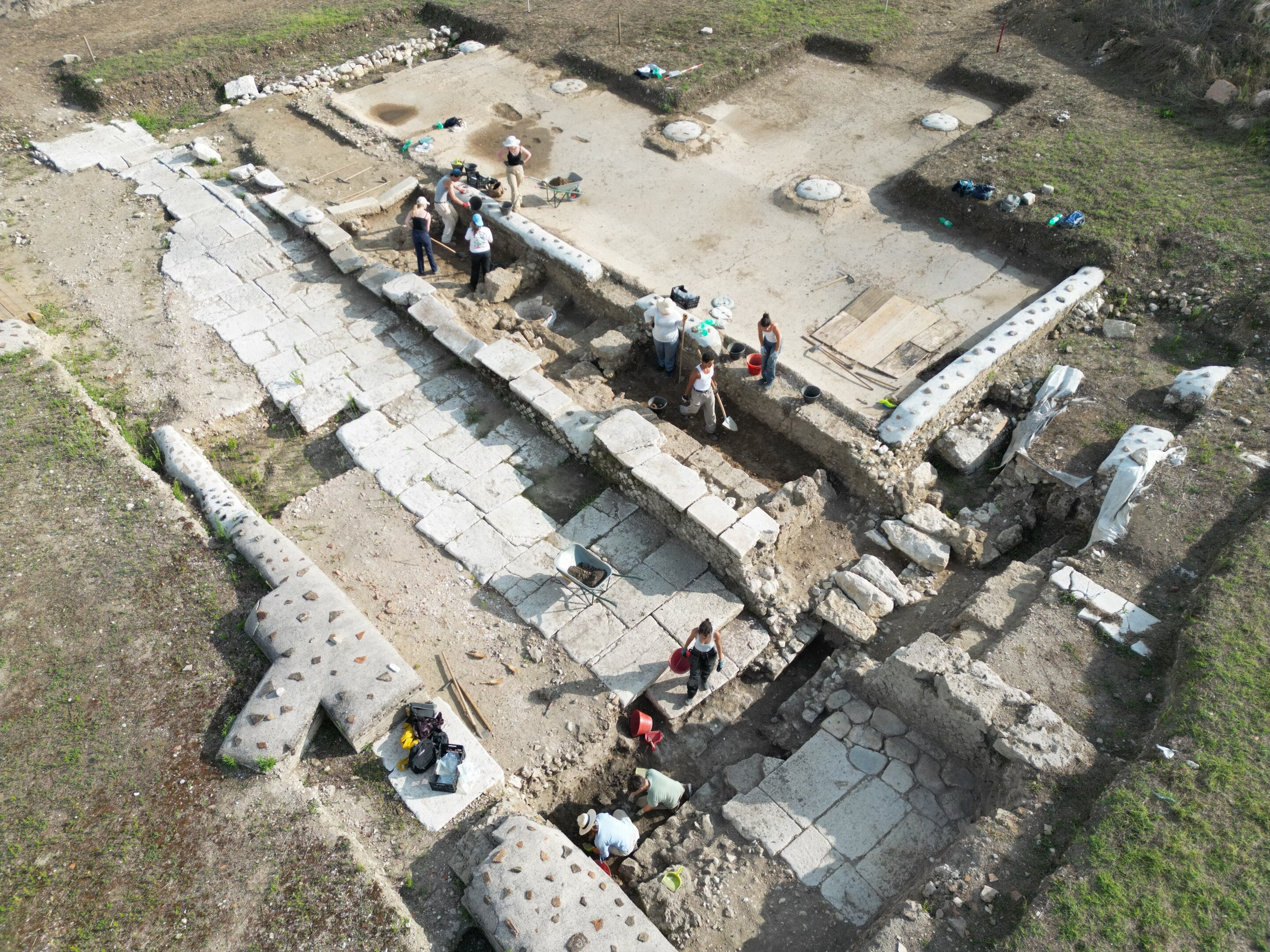 Drone view of the excavation of the two footpaths lining the street separating the basilica (top) from the theater (bottom) at Interamna Lirenas