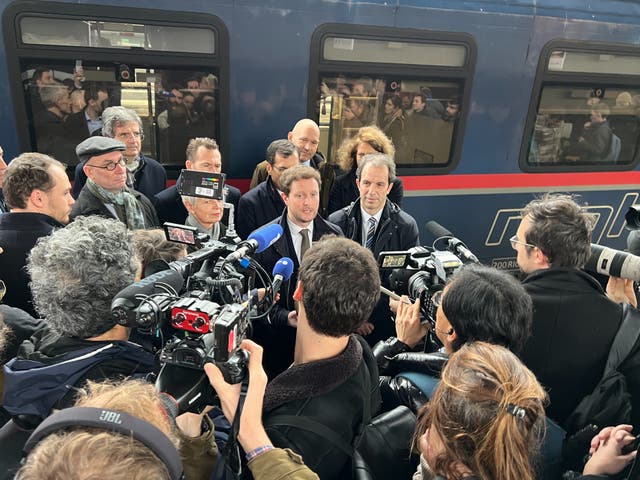 <p>Action station: Clément Beaune, French transport minister, speaking to reporters beside the revived Berlin-Paris sleeper train</p>