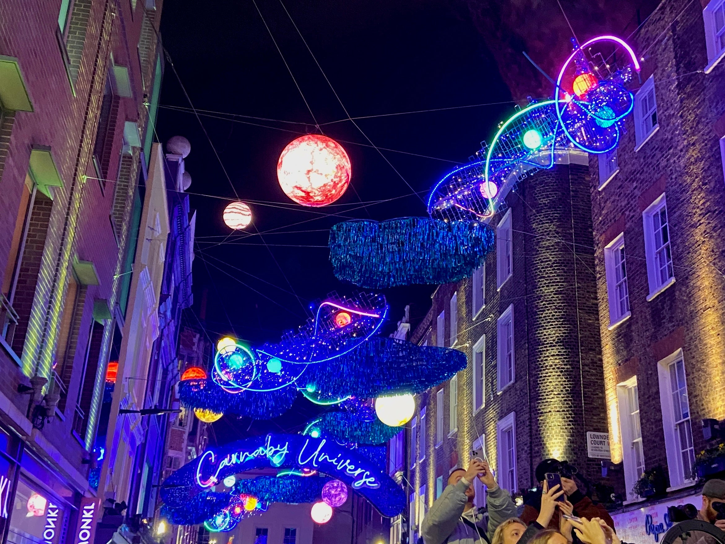 This year Carnaby Street has a whole solar system of lights overhead