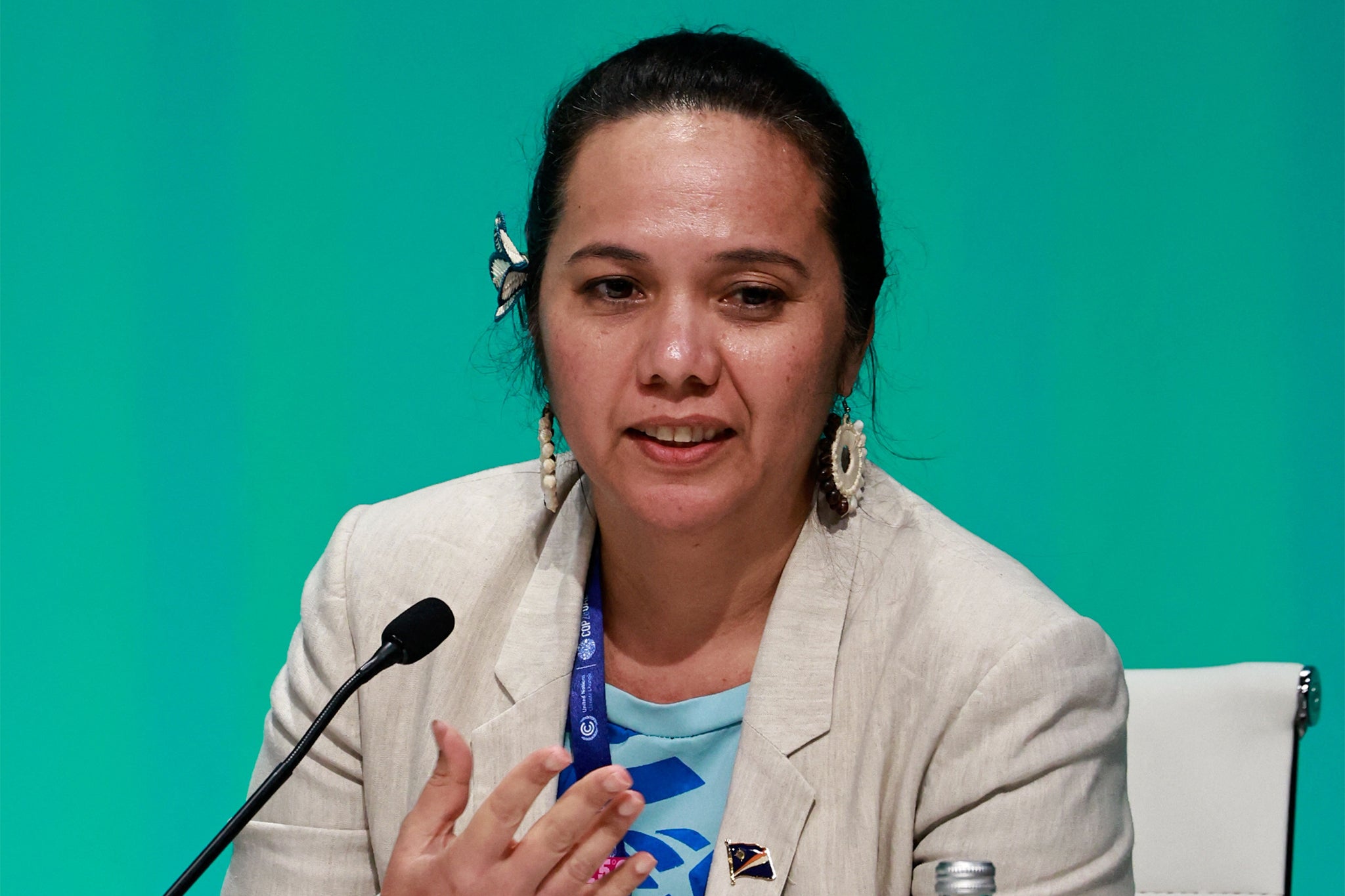 Climate Envoy for the Marshall Islands Tina Stege speaks during a press conference at Cop28 on 11 December in Dubai