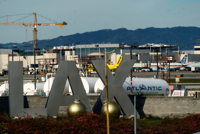 <p>A shirtless passenger was seen sprinting across the tarmac at the Los Angeles airport and toward a plane.</p>