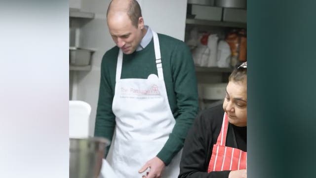 <p>Prince William dons apron to serve food to homeless in surprise charity visit.</p>