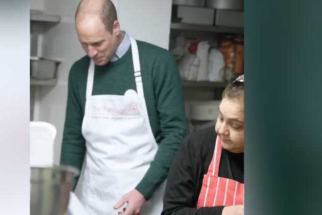 <p>Prince William dons apron to serve food to homeless in surprise charity visit.</p>