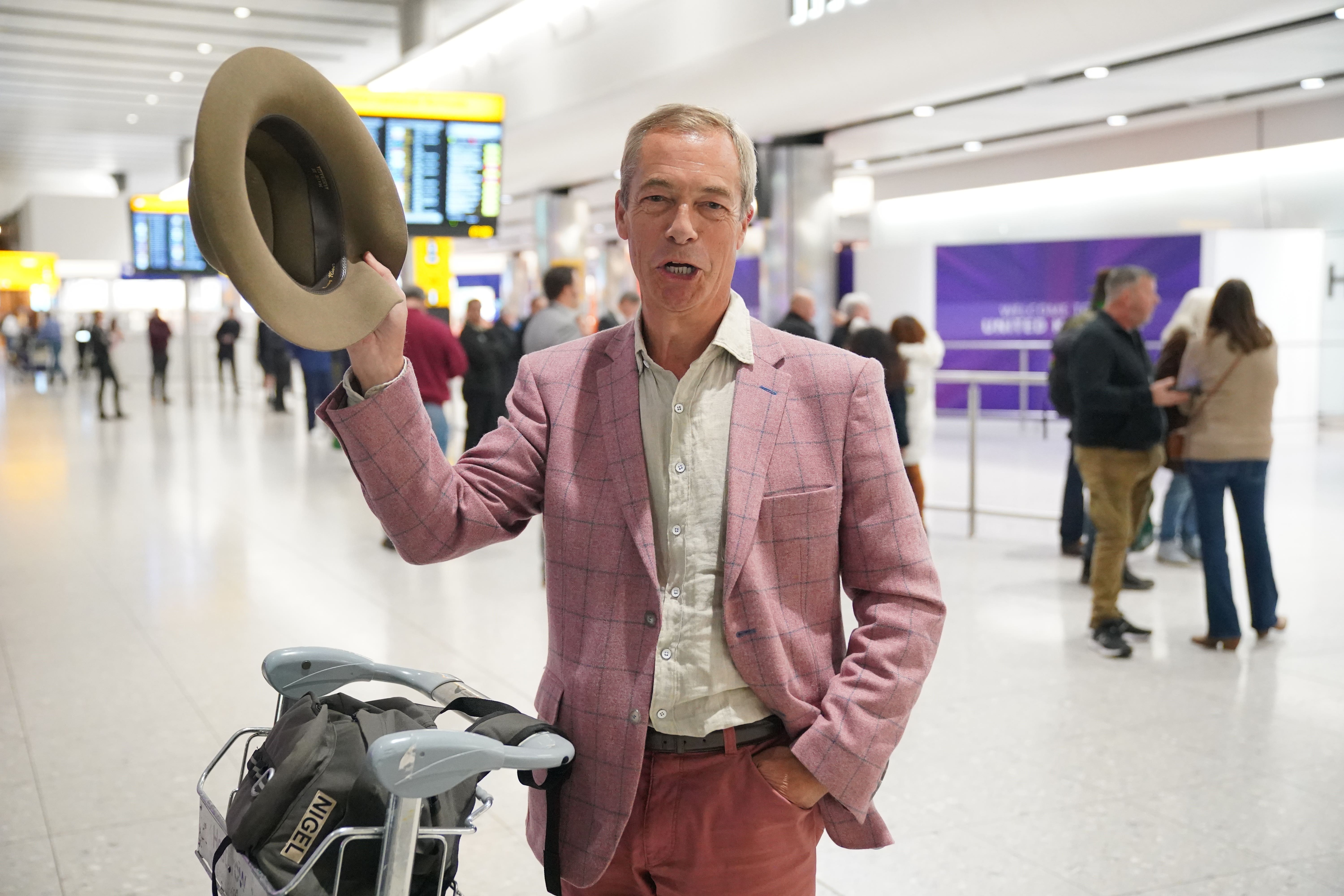 Nigel Farage arrives at Heathrow Airport after taking part in the ITV series