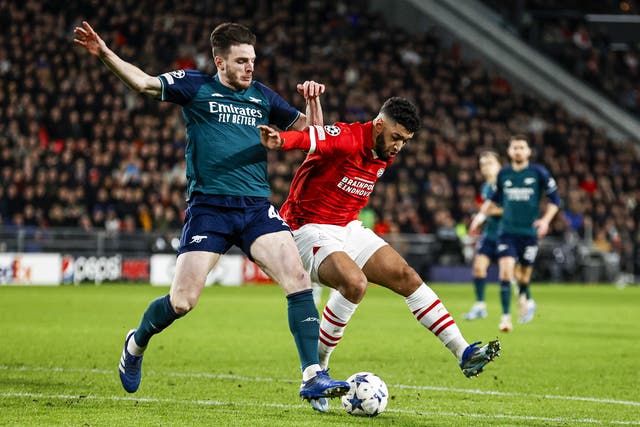<p>Declan Rice in action defending against PSV’s Ismael Saibari</p>